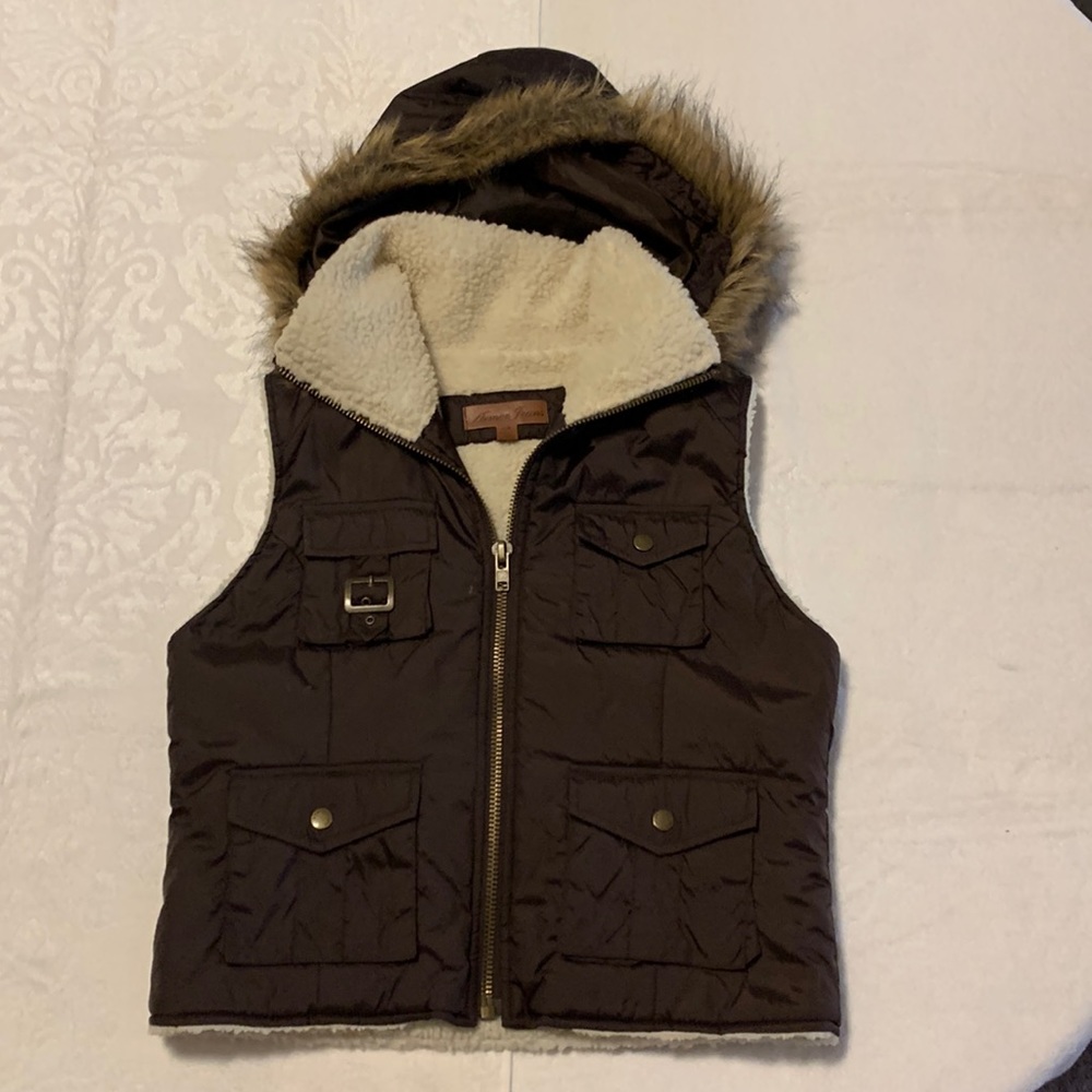 Ladies vest Sherpa lining inside brown canvas exterior material.